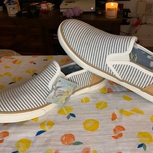 Blue, white, and tan slip on shoes size 7 1/2